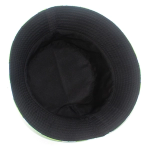 Detailed inner view of black reversible bucket hat showing quality stitching and green pattern