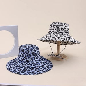 Close-up of wide brim leopard print sun hats with windproof straps in multiple colors
