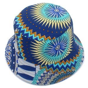 Detail of bohemian bucket hat with vibrant geometric patterns in blue and orange