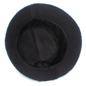 Detail view of cotton bucket hat interior showing neat stitching and vibrant floral print