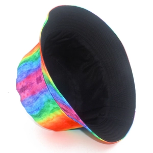Detail of reversible rainbow tie-dye bucket hat showing black inner fabric and stitching
