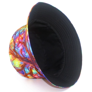 Detail of colorful abstract tree pattern bucket hat with black lining and smooth edges