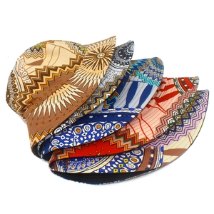 Close-up of five fisherman hats featuring ethnic geometric prints and vibrant wavy patterns