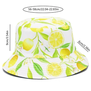 Detailed dimensions of white cotton bucket hat with vibrant lemon print and green leaves