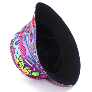 Detail showing retro 80s pop art print on bucket hat with magnetic tape patterns