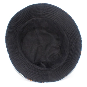 Close-up of the internal fabric lining and reinforced stitching of a black bucket hat