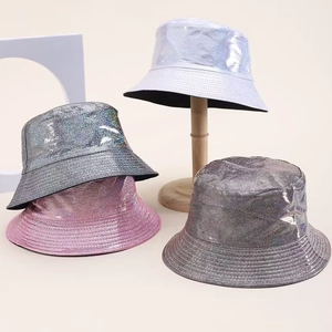 Close-up of laser PU bucket hats with holographic finish and metallic sewing details