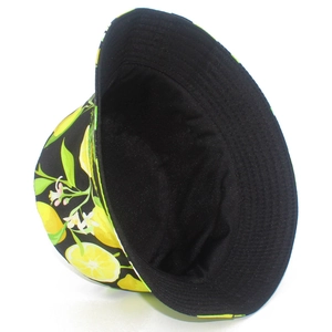 Detail of summer bucket hat with lemon fruit print and contrast black inner lining