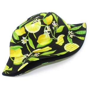 Detailed pattern of yellow lemons and green leaves on black canvas bucket hat