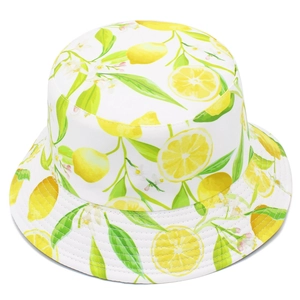 Detail of white canvas bucket hat featuring fresh lemon and green leaf pattern prints