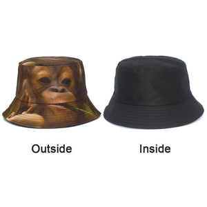 Dual-sided bucket hat with realistic gorilla print and solid black interior details