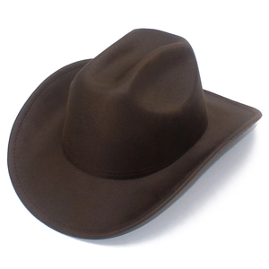 Detailed macro view of the dark brown felt cowboy hat with a curved brim and pinched crown