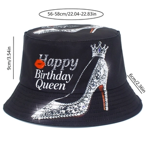 Detail of black cotton bucket hat featuring Happy Birthday Queen print and sizing dimensions
