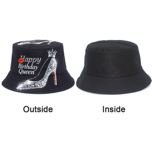 Detail view of black Happy Birthday Queen bucket hat with sparkling heels and crown print