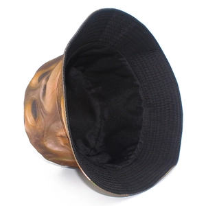 Detailed interior view of the orange gorilla print bucket hat with black lining