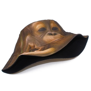 Detail view of stylish bucket hat featuring a realistic gorilla print and black inner lining
