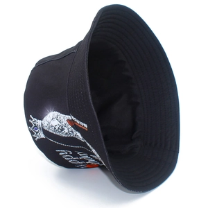 Detail of black bucket hat featuring a crown and Happy Birthday lettering print