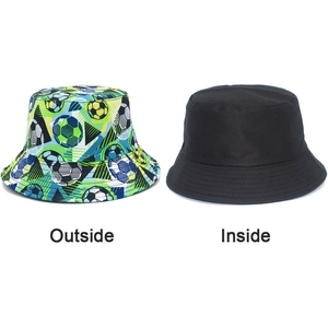 Detail of reversible bucket hat with soccer print on one side and solid black on the other