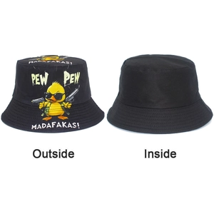 Detail view of reversible black bucket hat with cartoon yellow duck print and plain side
