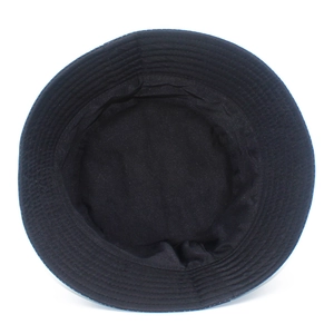 Internal stitching details and fabric texture of the black fashion bucket hat