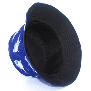 Detail view of blue shark pattern bucket hat showing reinforced stitching and black lining