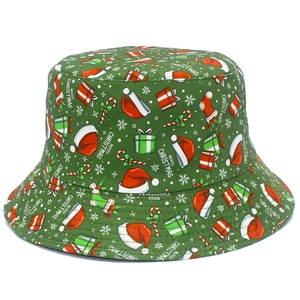 Unisex green bucket hat with festive Christmas prints including Santa hats and gift boxes