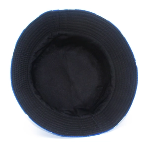 Detail of shark print bucket hat showing reversible black inner lining and quality stitching