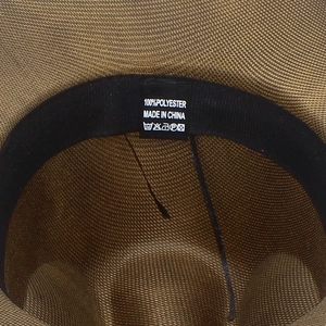 Detail view of brown polyester felt hat interior with black sweatband and care label