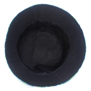 Detail of interior black lining and blue-green patterned brim with reinforced stitching