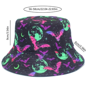 Detail showing colorful bat and moon patterns on the black festive bucket hat