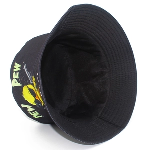 Detailed view of black canvas bucket hat featuring cute cartoon duck and pew pew print