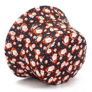 Detailed view of Christmas bucket hat featuring Santa Claus prints and snowflake patterns