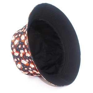 Detail of Christmas bucket hat with Santa print and reversible black inner lining