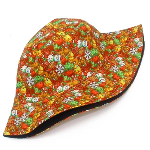 Christmas bucket hat with cartoon gingerbread man and reindeer prints on white background
