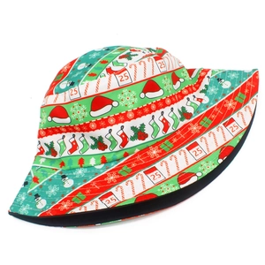 Double-sided Christmas bucket hat with Santa and snowman patterns in red and green colors