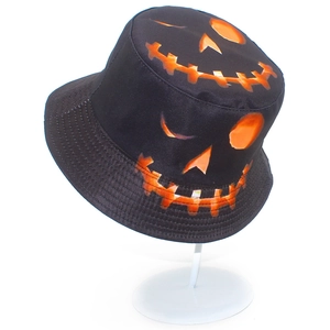 Double-sided Halloween bucket hat with orange pumpkin face print on black fabric