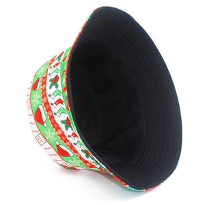 Detail view of Christmas bucket hat with festive patterns and interior black lining