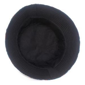 Detail view of the black cotton lining and reinforced stitching on a Christmas bucket hat