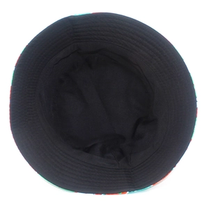 Internal view of fisherman hat showing black lining and colorful festive prints