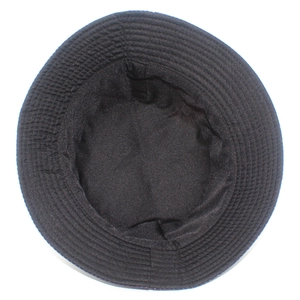 Detail view showing the reinforced stitching and durable texture on the black bucket hat brim