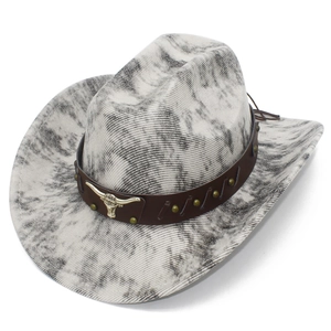 Detail of western cowboy hat featuring marble texture and metallic bull skull ornament