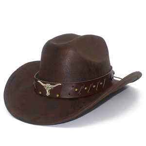 Dark brown cowboy hat with leather belt, metal bull head emblem and vintage texture