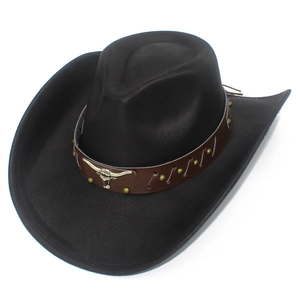 Detail of western cowboy hat featuring leather band with studs and silver bull head logo