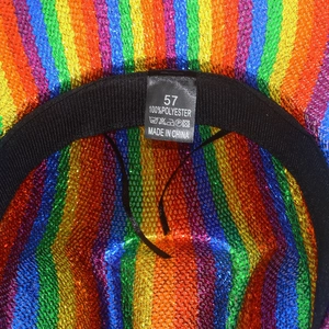 Detail view of colorful jazz hat interior showing 100% polyester label and sweatband