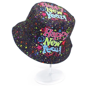 Reversible Happy New Year bucket hat with colorful star prints and festive text design