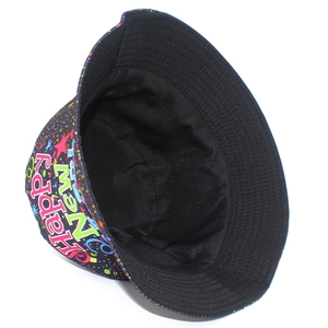 Close-up of Happy New Year printed bucket hat with colorful firework patterns