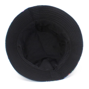 Top view of bucket hat interior showing black lining and colorful speckled brim detail