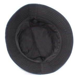 Detail view showing inner sweatband and reinforced stitching on a black cotton bucket hat