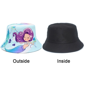 Detail of reversible sun hat showing blue mermaid print outside and plain black inside