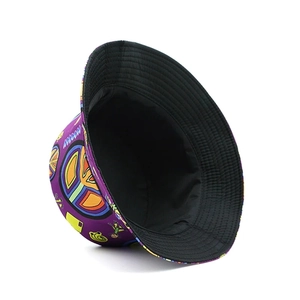 Detail view of purple graffiti bucket hat featuring colorful pop art and peace symbols